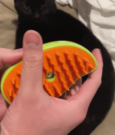 GIF das cerdas de silicone laranja da escova em movimento